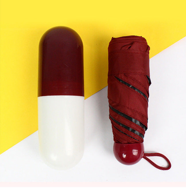 Umbrella capsule mini portable sun umbrella wholesale 50% off black glue sun protection sunny and rainy dual-purpose advertising umbrella customization