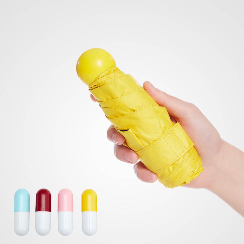 Umbrella capsule mini portable sun umbrella wholesale 50% off black glue sun protection sunny and rainy dual-purpose advertising umbrella customization